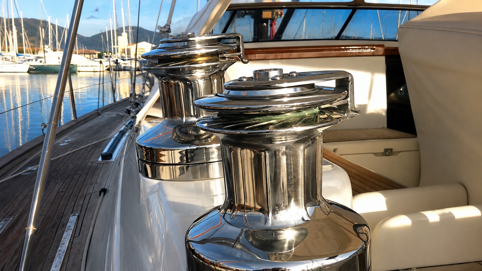 Polished stainless-steel deck winches.